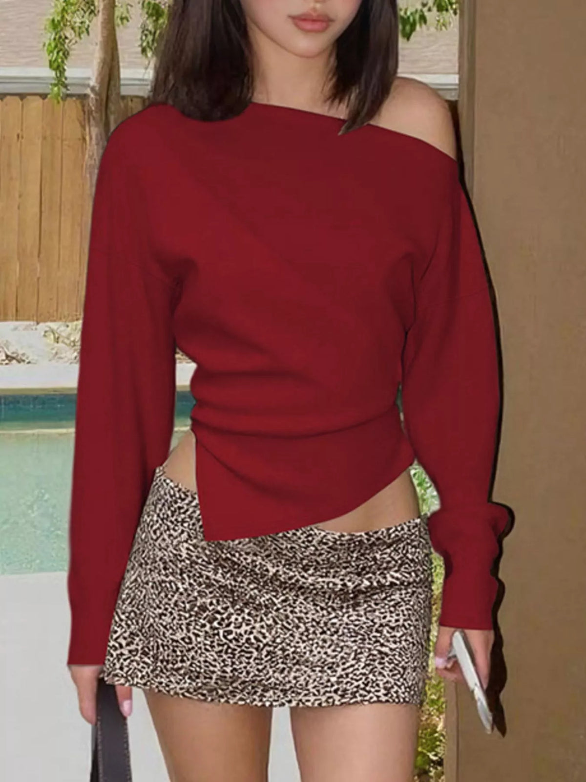 Asymmetrical off-shoulder long sleeve T-shirt by Plush Fashion Hub, featuring a stylish design and fitted silhouette.