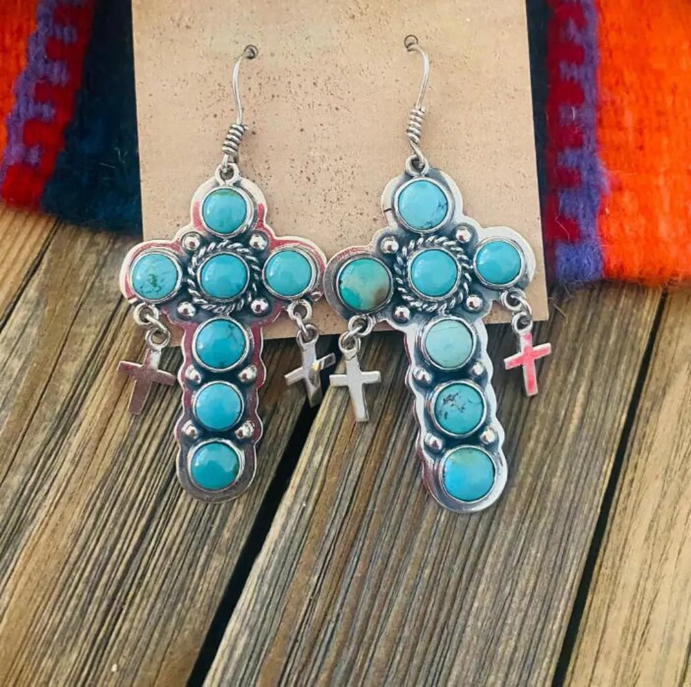 Turquoise cross-shaped earrings by Plush Fashion Hub, stylish artificial earrings with vibrant blue gemstone design.