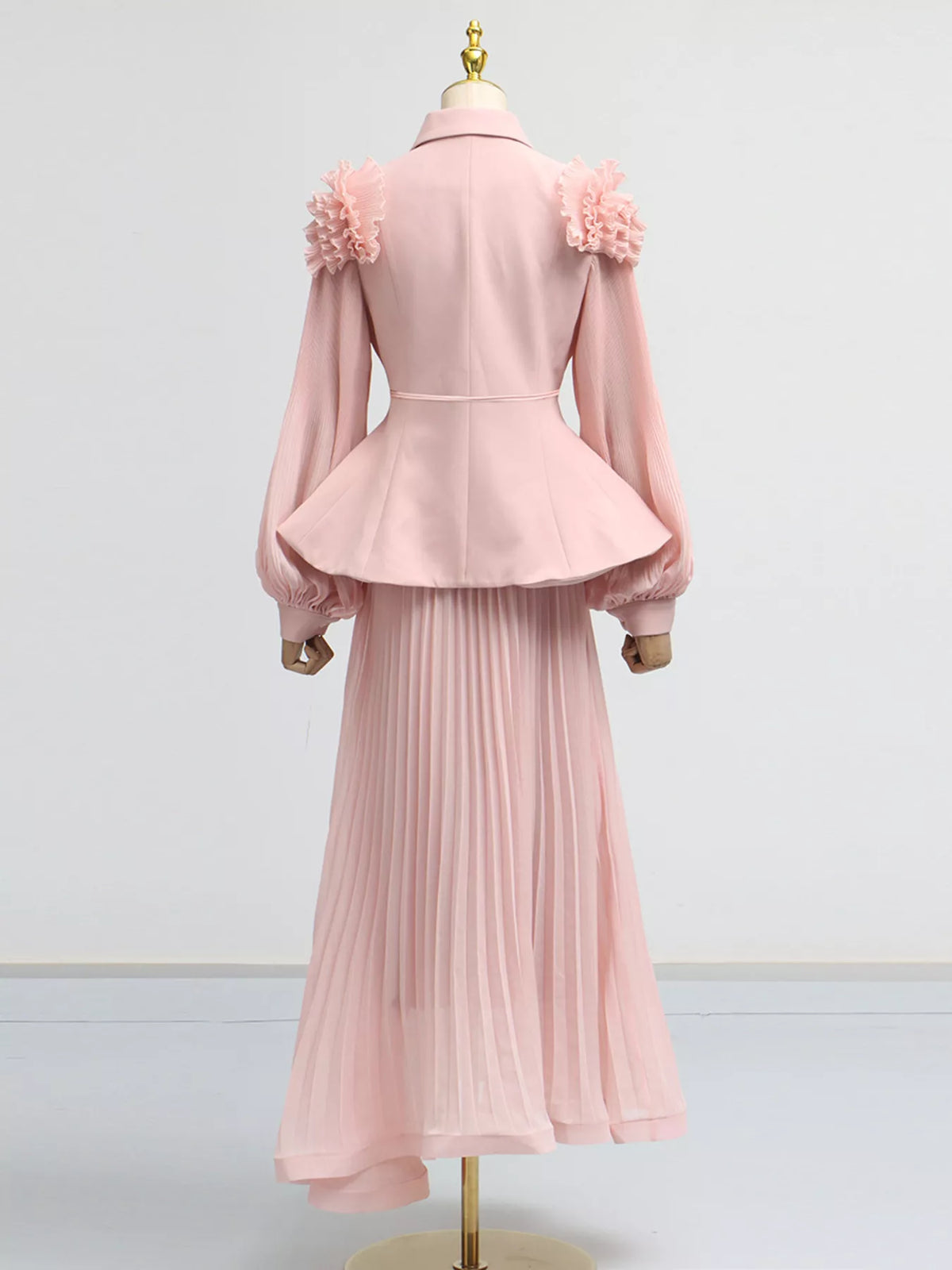 Plush Fashion Hub two-piece set featuring a frill lapel collar top and a pleated skirt, stylish and coordinated clothing ensemble.