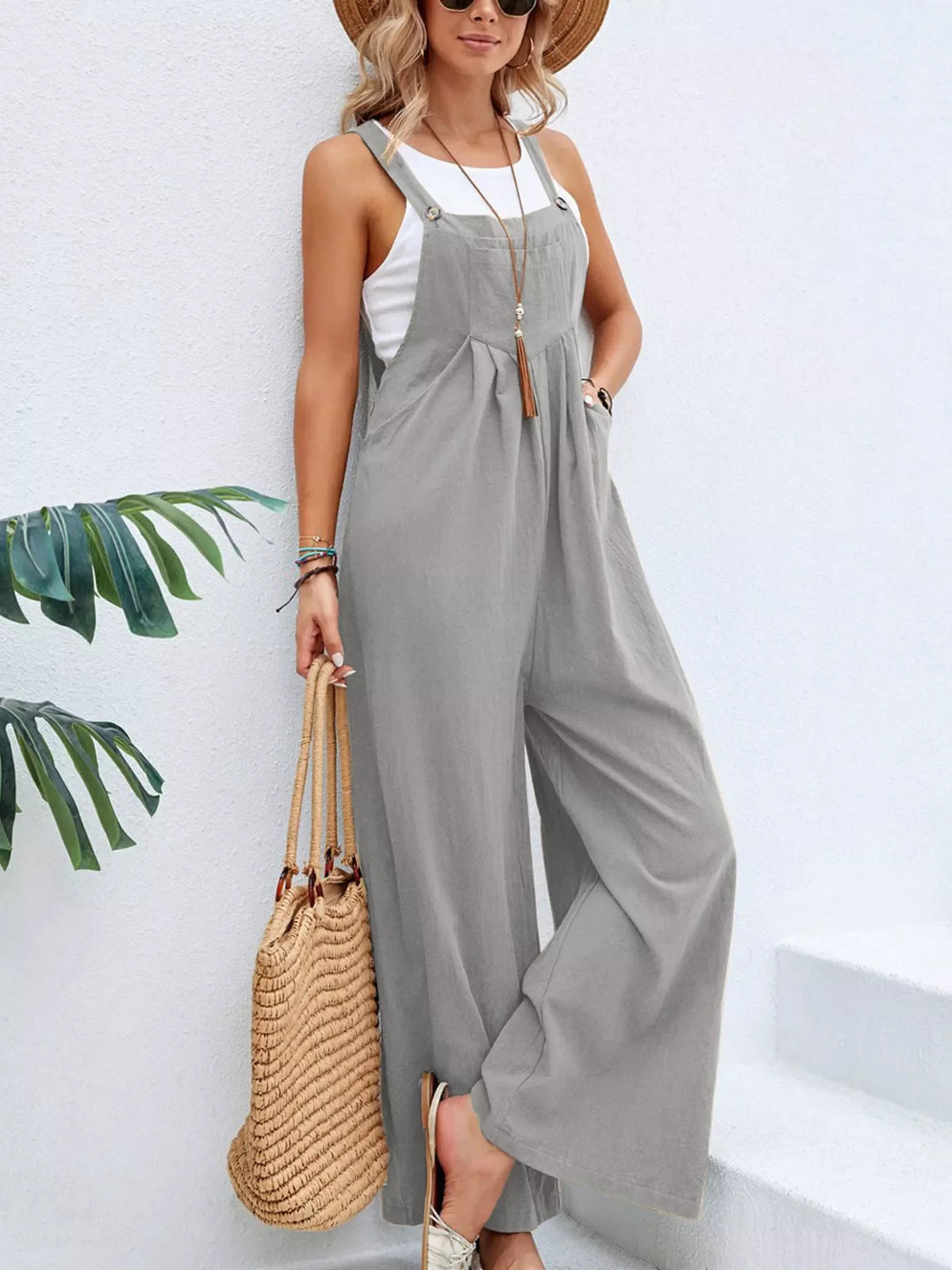 Plus size casual wide-leg jumpsuit with pockets from Plush Fashion Hub, full-length overalls styled for comfort and everyday wear.