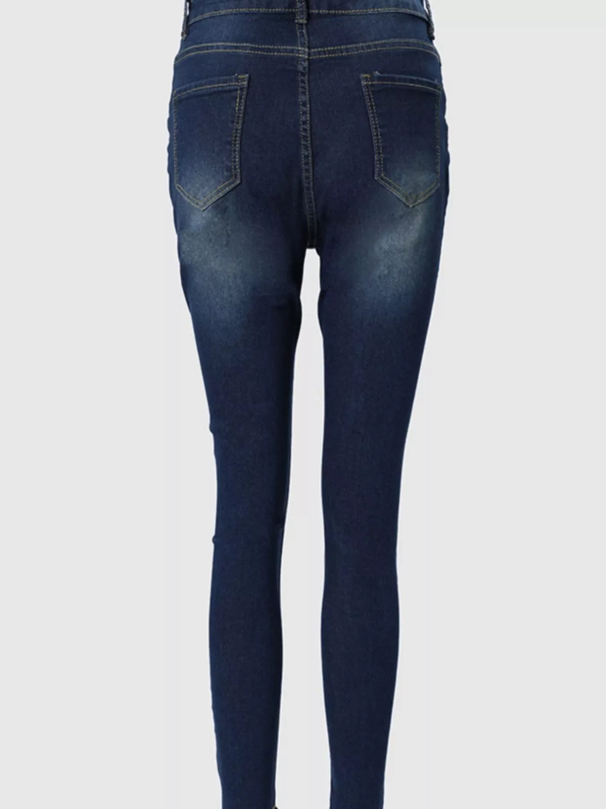 Plush Fashion Hub zipper front skinny jeans displayed on a model, showing fitted denim with front zipper closure and classic five-pocket design.