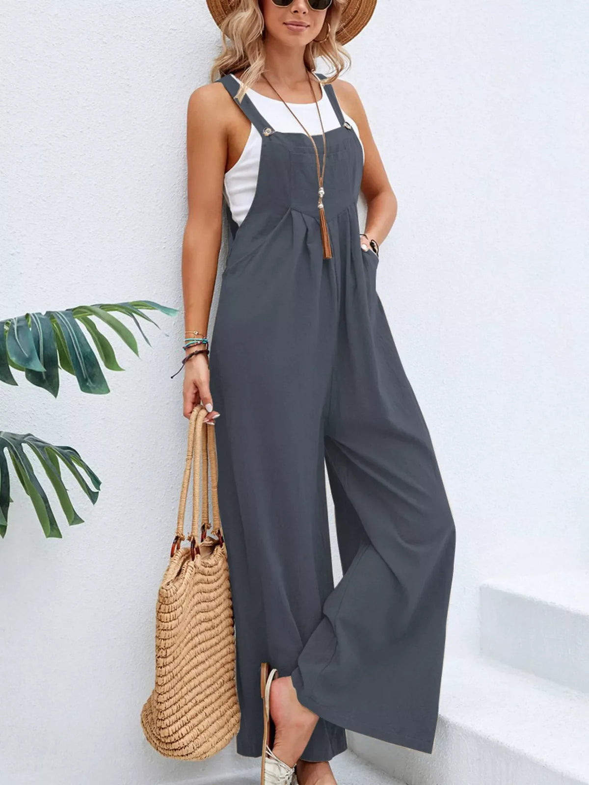 Full size casual wide-leg jumpsuit with pockets from Plush Fashion Hub, featuring a comfortable, stylish plus-size design.