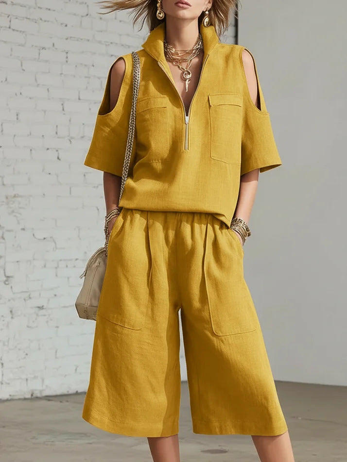 Casual short-sleeve shirt and loose shorts two-piece set by Plush Fashion Hub, featuring comfortable fabric and relaxed fit.