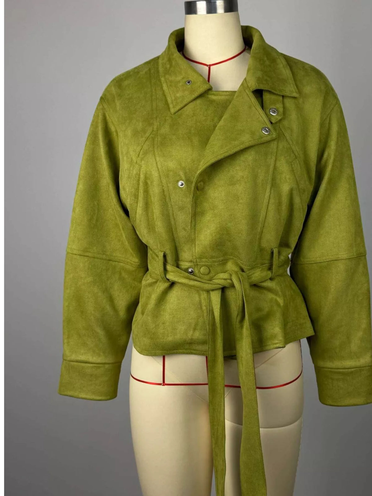 Women's tie waist long sleeve cropped jacket from Trendsi, featuring a stylish design and fitted silhouette.