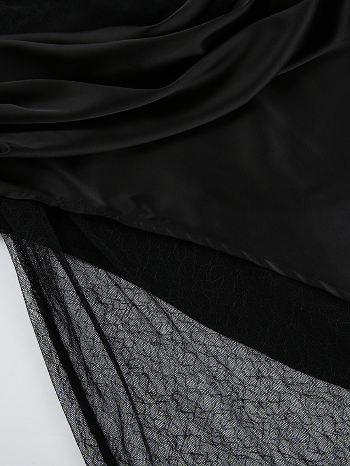 Women’s elegant lace midi skirt with sheer split detail from Plush Fashion Hub, showcasing a flowing design and intricate lace fabric.