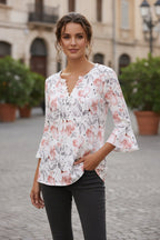 Women’s printed spike button three-quarter sleeve casual top by Plush Fashion Hub, featuring a stylish design and comfortable fit.