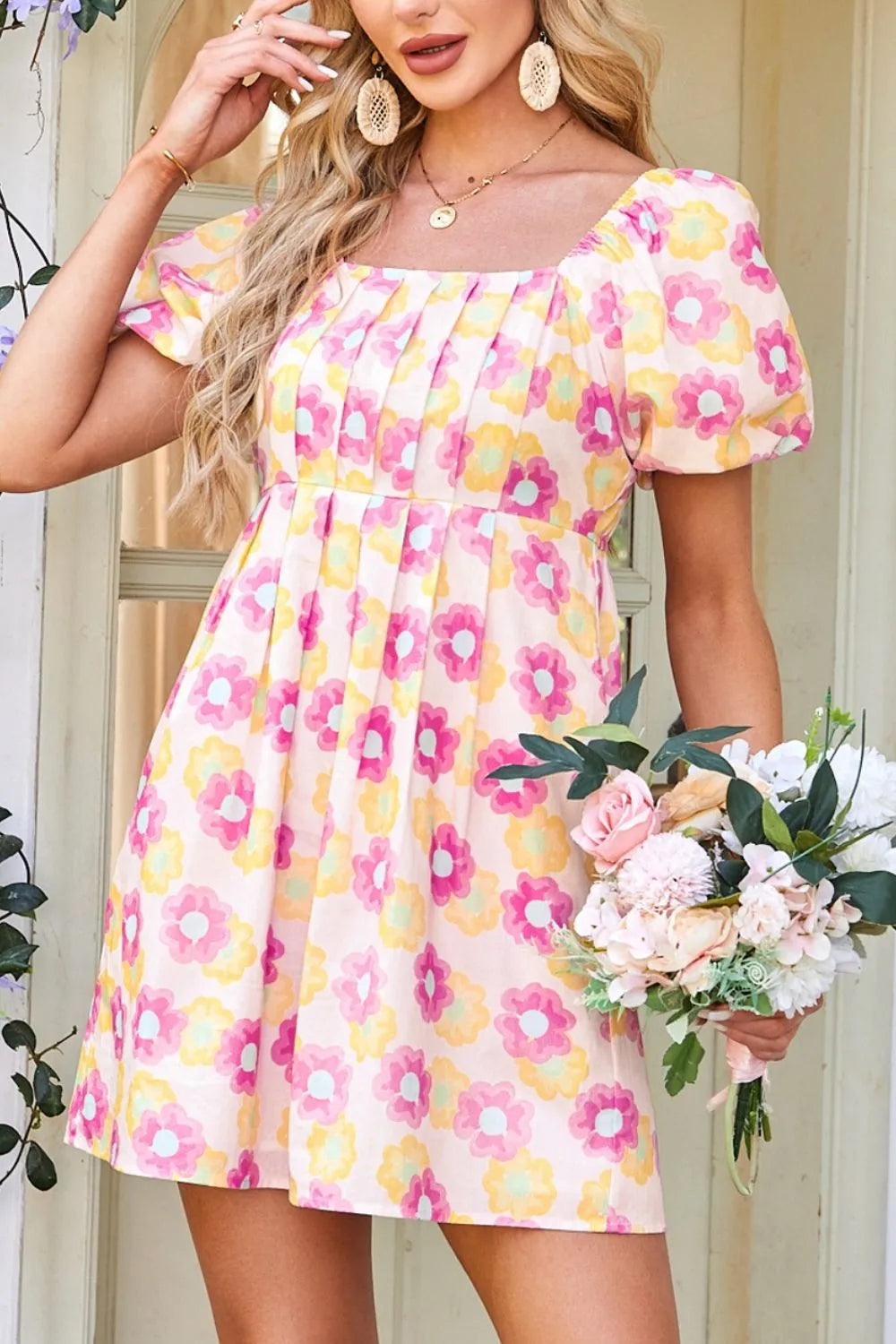 Floral square neck puff sleeve cotton midi dress with pleated flared design, stylish and elegant for versatile occasions.