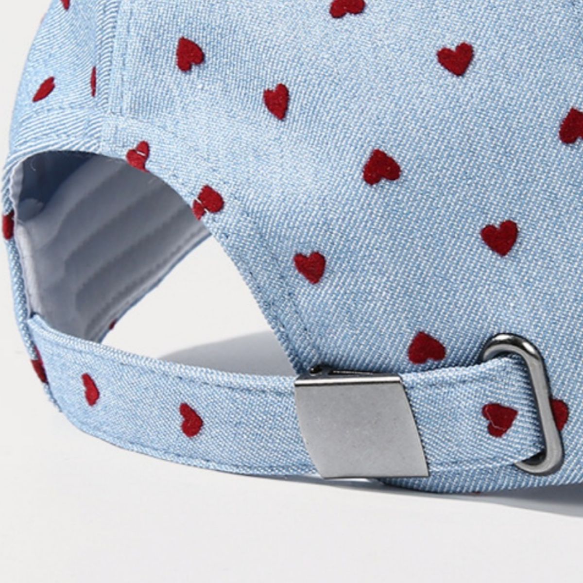 Women’s heart print casual baseball hat by Plush Fashion Hub, adjustable sport cap with stylish heart-themed design.