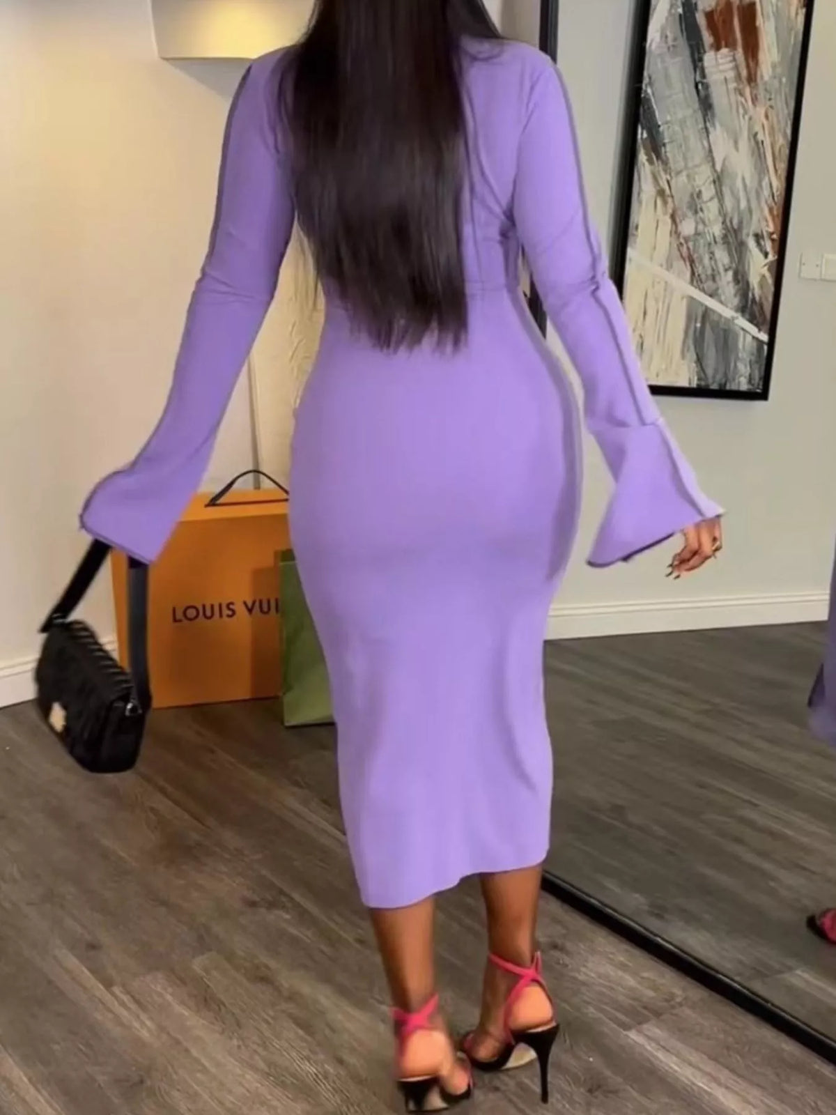 Button front long sleeve midi dress by Plush Fashion Hub featuring a sleek design and midi length, perfect for elegant daytime wear.