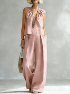 Women's sleeveless cotton-linen casualwear set by FitiqueFit, featuring a stylish sleeveless shirt and matching pants.