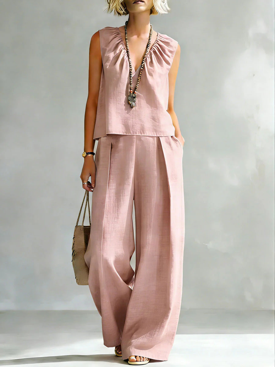 Women's sleeveless cotton-linen casualwear set by FitiqueFit, featuring a stylish sleeveless shirt and matching pants.