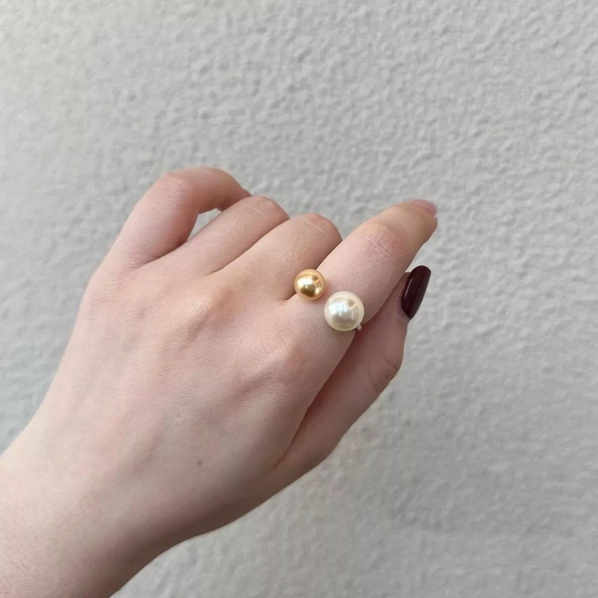 Plush Fashion Hub double pearl open ring featuring two elegant white pearls on a sleek silver band.