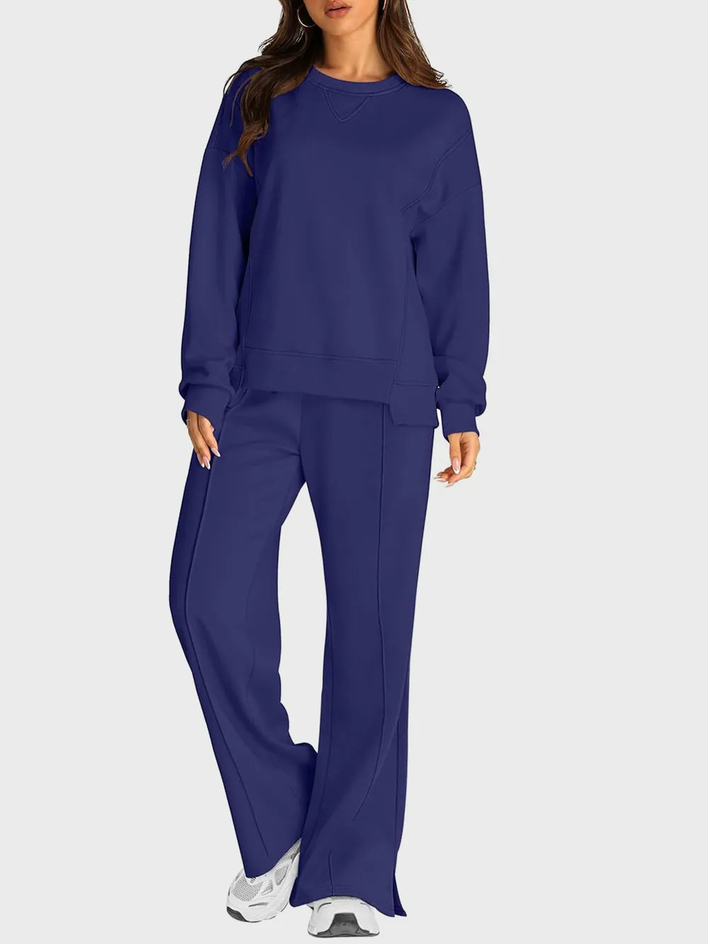 Trendsi round neck long sleeve top and slit pants set, stylish matching outfit with a fitted top and flowy slit pants.