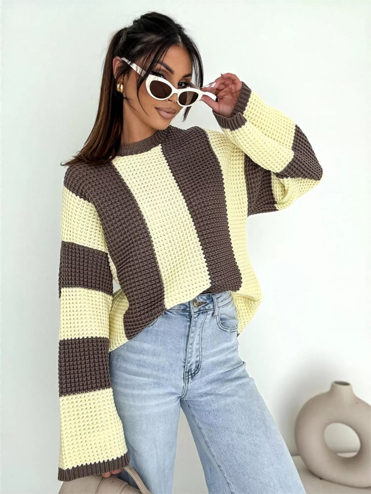 Color block long sleeve sweater from Trendsi, featuring a stylish design with bold color panels and a comfortable fit.