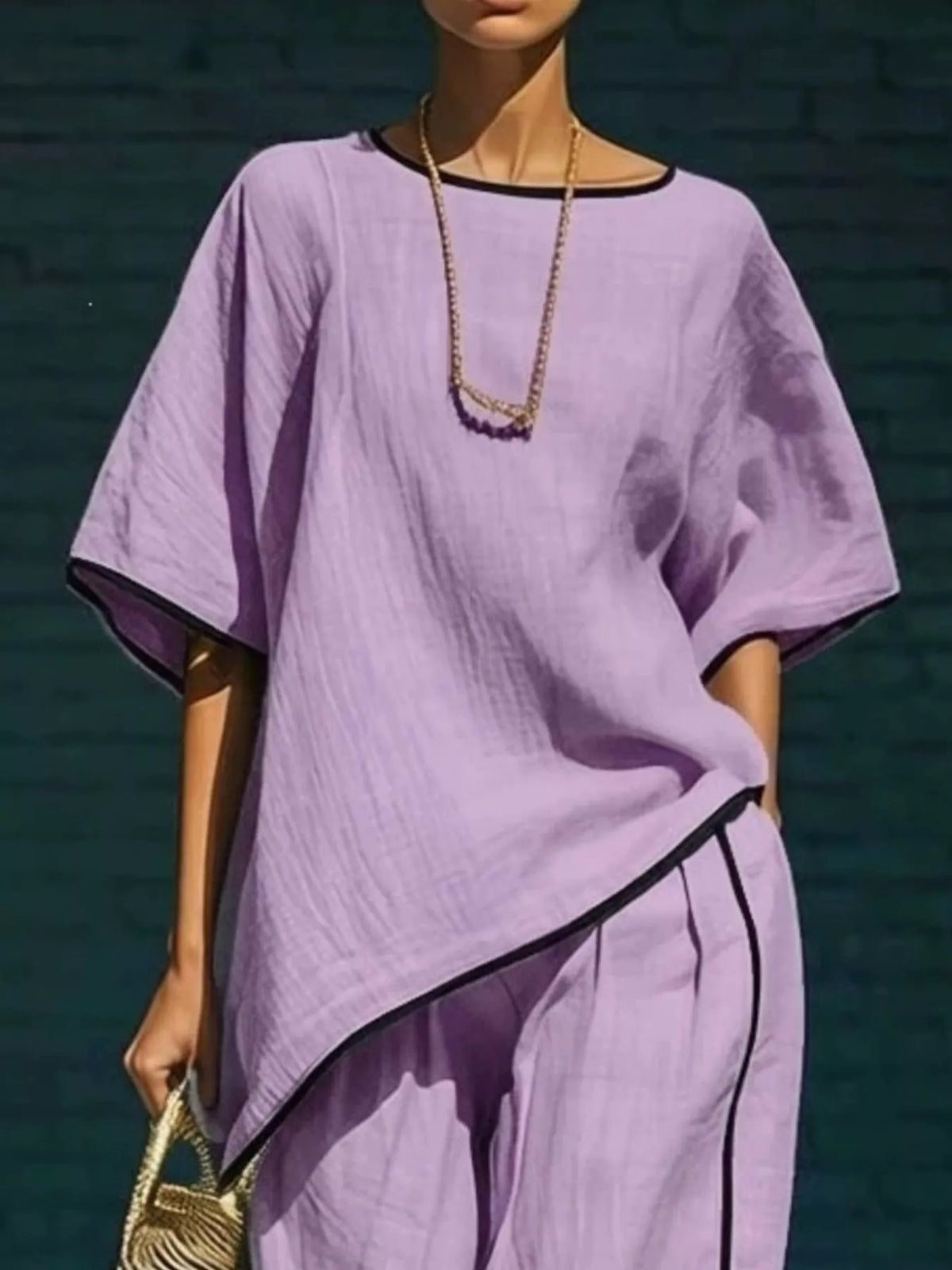 Plush Fashion Hub contrast trim round neck top and pants matching set, featuring a stylish coordinated outfit with color accents.