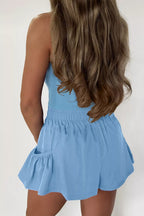 Ribbed slim tank top with pocket details paired with wide-leg shorts in a matching set, trendy and comfortable for casual wear.