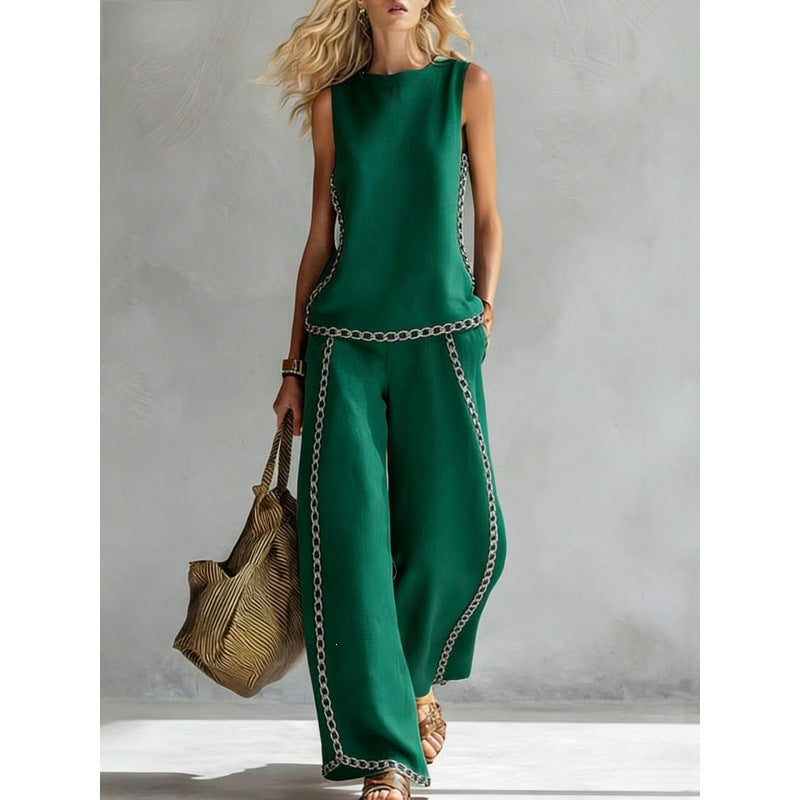Printed retro sleeveless top and wide-leg pants set by FitiqueFit, featuring vibrant prints in a stylish two-piece design.