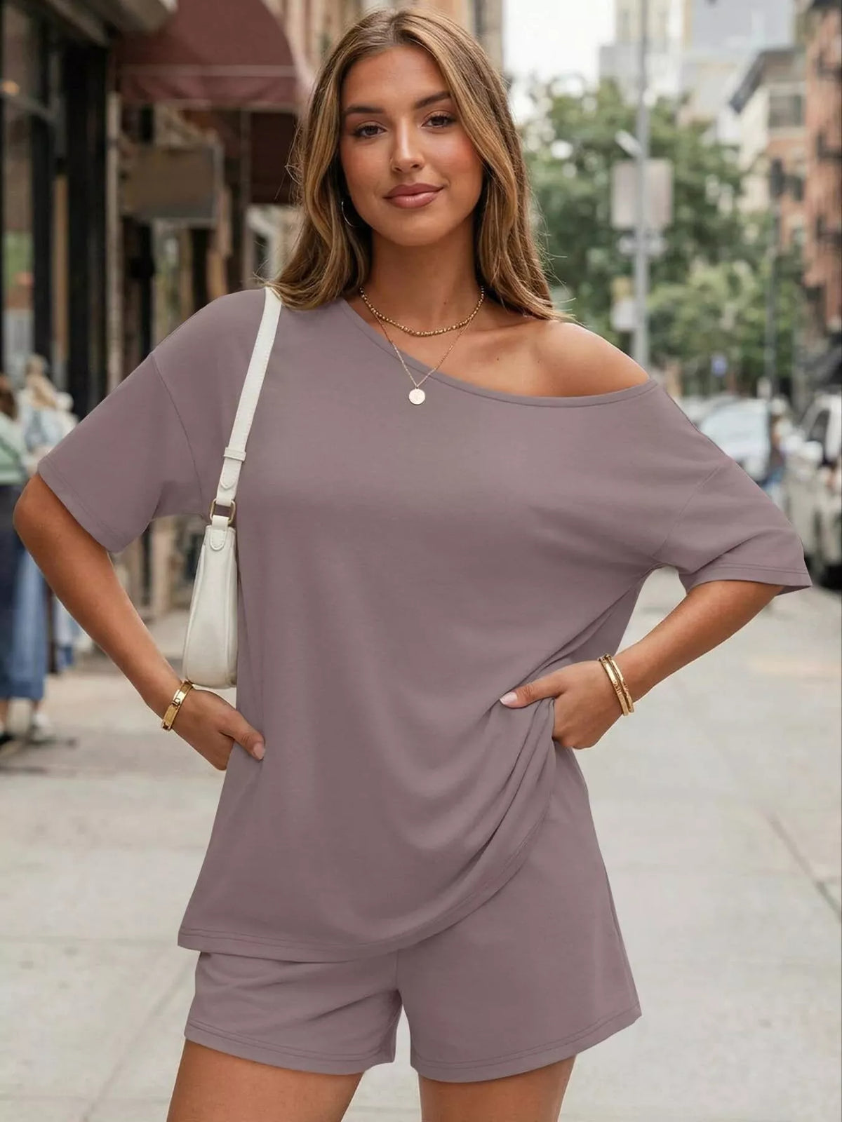 Plus size women's boat neck T-shirt and shorts lounge set by Plush Fashion Hub, displayed on a model in a relaxed pose.