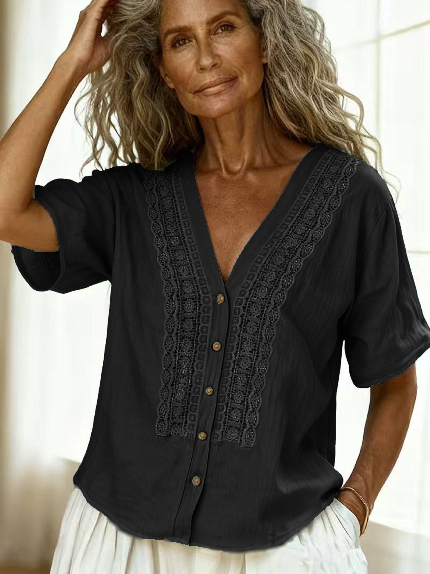 Women's loose-fit faux linen embroidered button-up top by FitiqueFit, featuring casual style with intricate embroidery and relaxed fit.