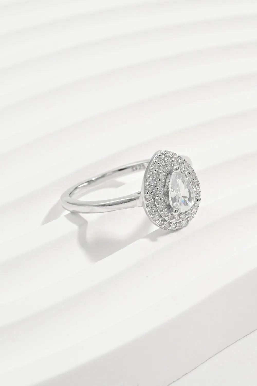 925 sterling silver Inland Zircon ring with intricate design, showcasing sparkling zircon stones and polished silver band.