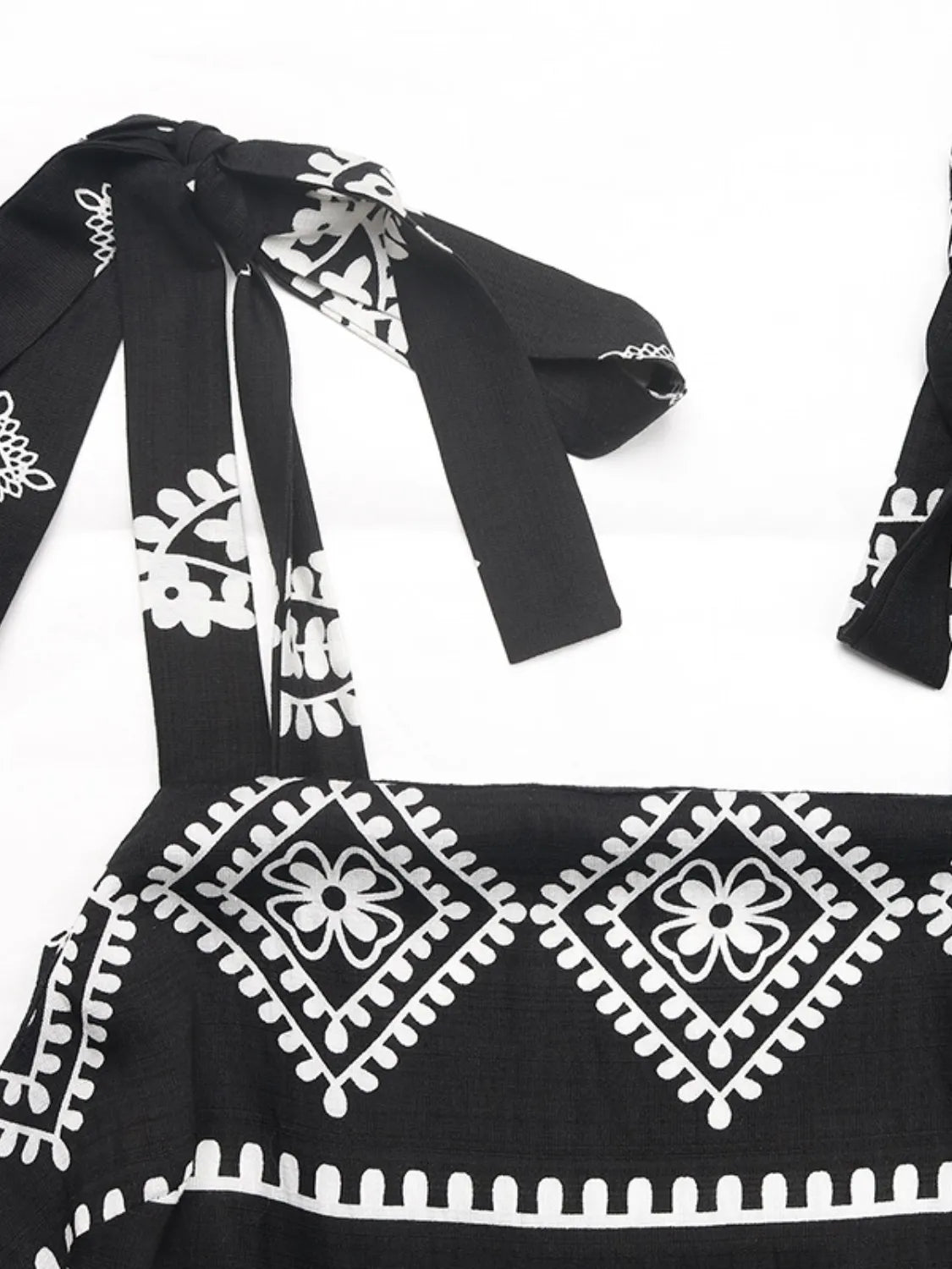 Printed square neck maxi cami dress by Plush Fashion Hub, featuring a flowing silhouette and stylish design.