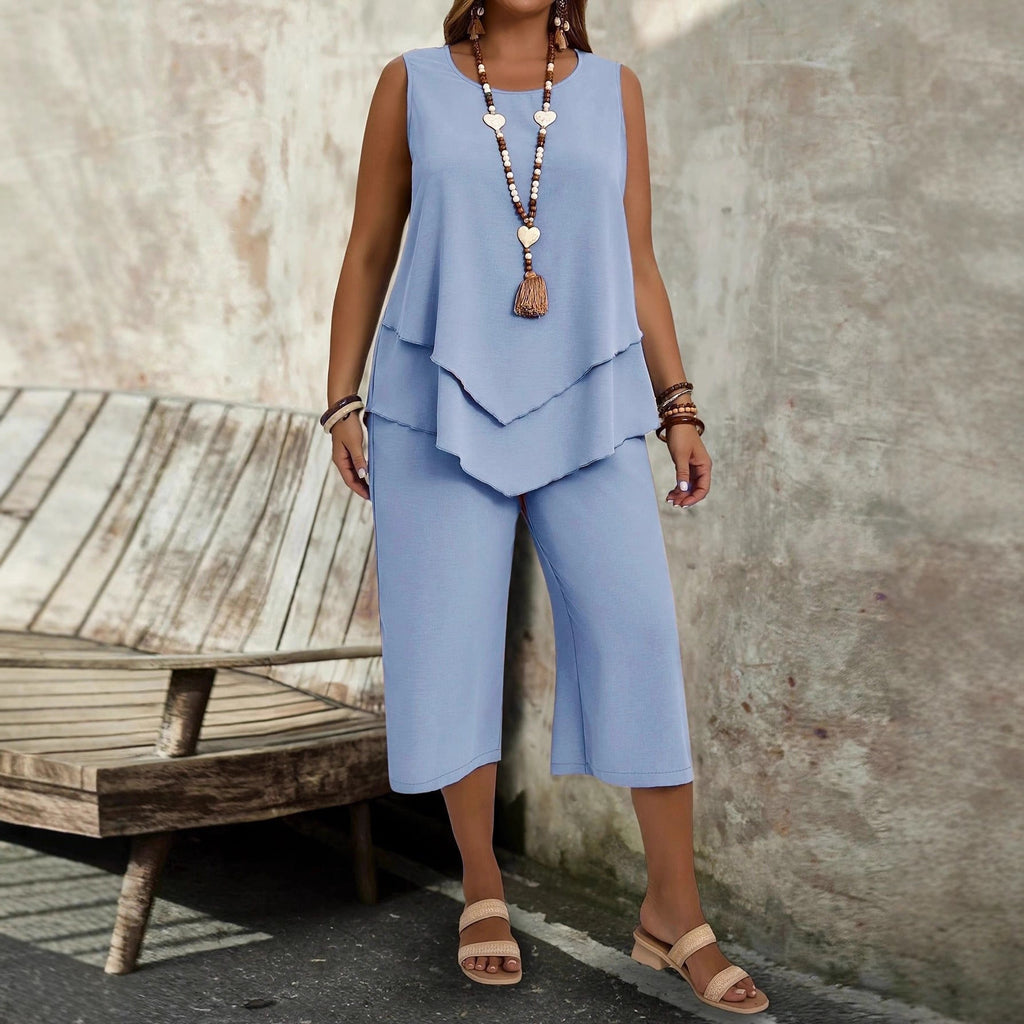 Casual solid-colored sleeveless top and cropped pants two-piece set from Plush Fashion Hub, displayed on a neutral background.