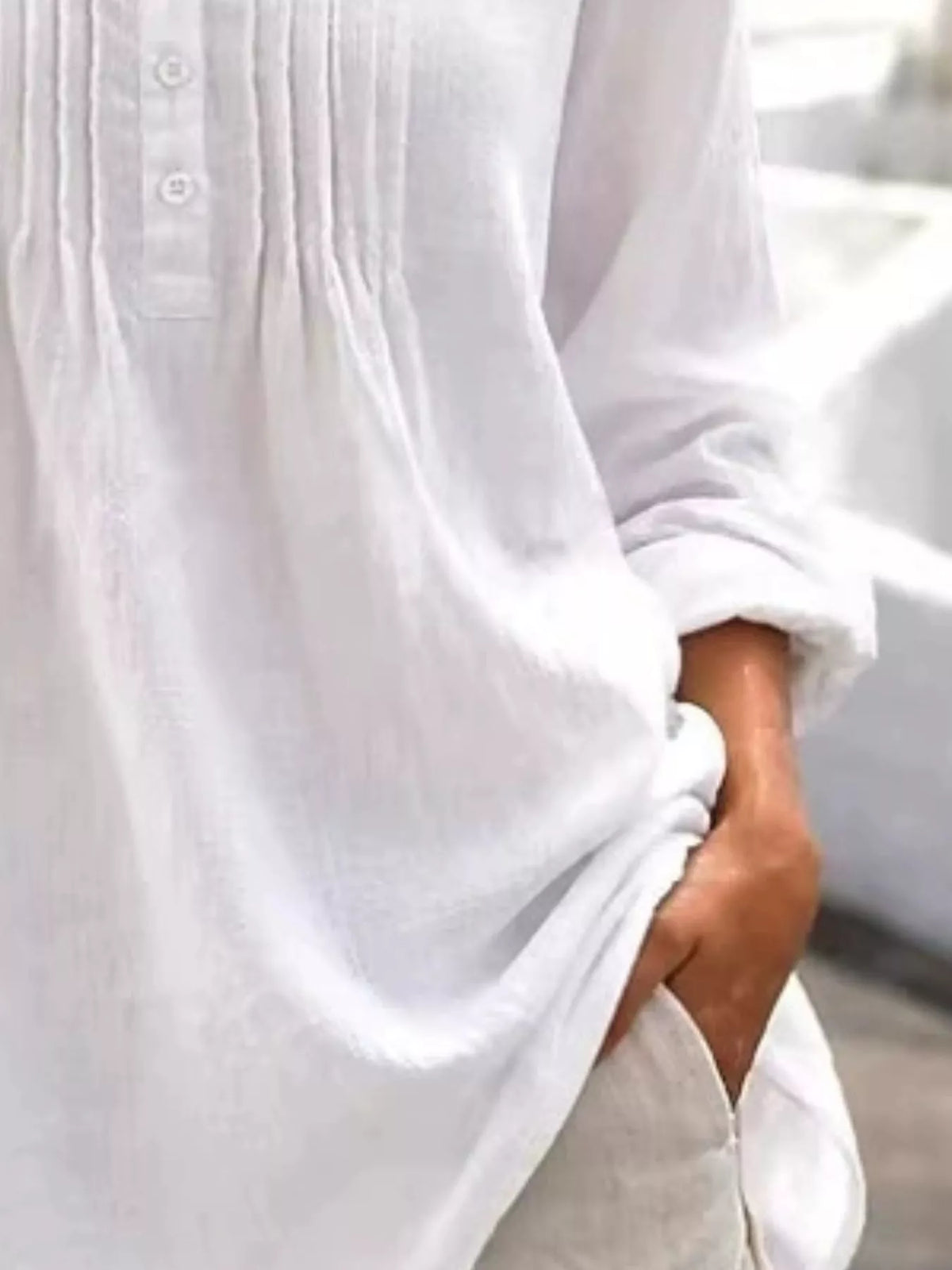 Casual long sleeve linen shirt with button details from Trendsi, featuring a relaxed fit and lightweight fabric.