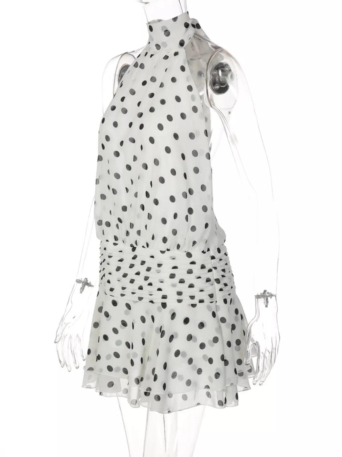 Polka dot halter neck ruffle dress from Plush Fashion Hub featuring a stylish design and playful pattern.