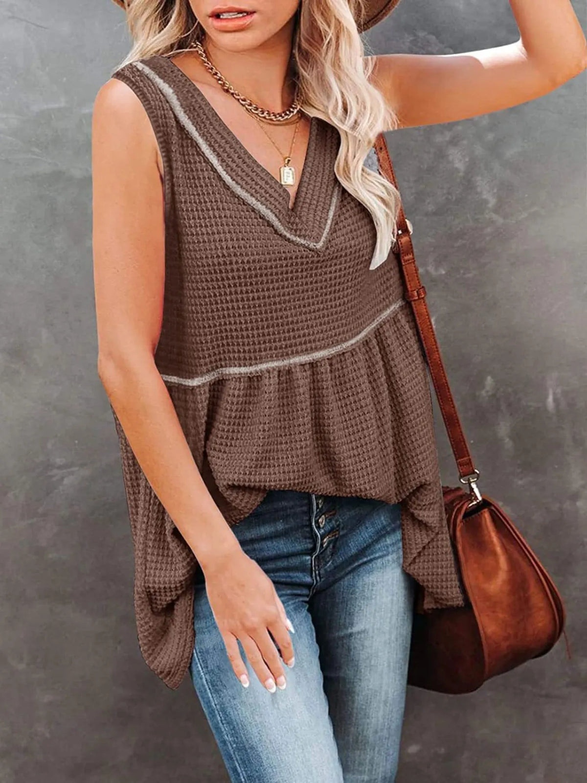 Plush Fashion Hub V-neck waffle knit tank top with contrast stitching, featuring a fitted sleeveless design and textured fabric.