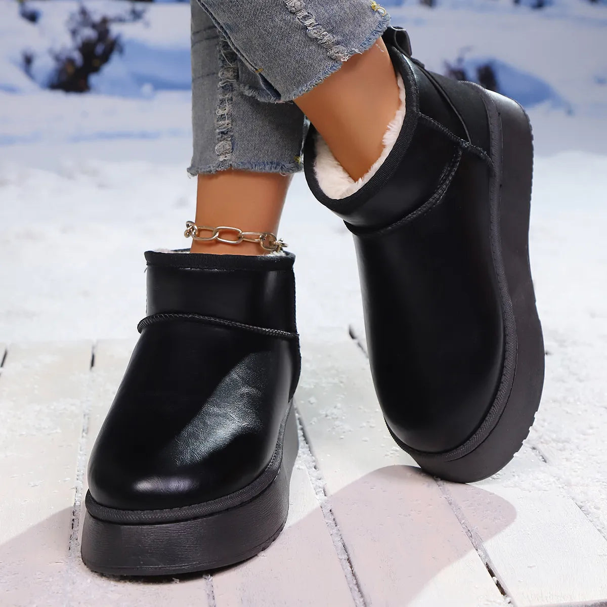 Faux-fur platform ankle boots by Trendsi featuring a stylish design with plush faux fur and chunky heel for a trendy look.