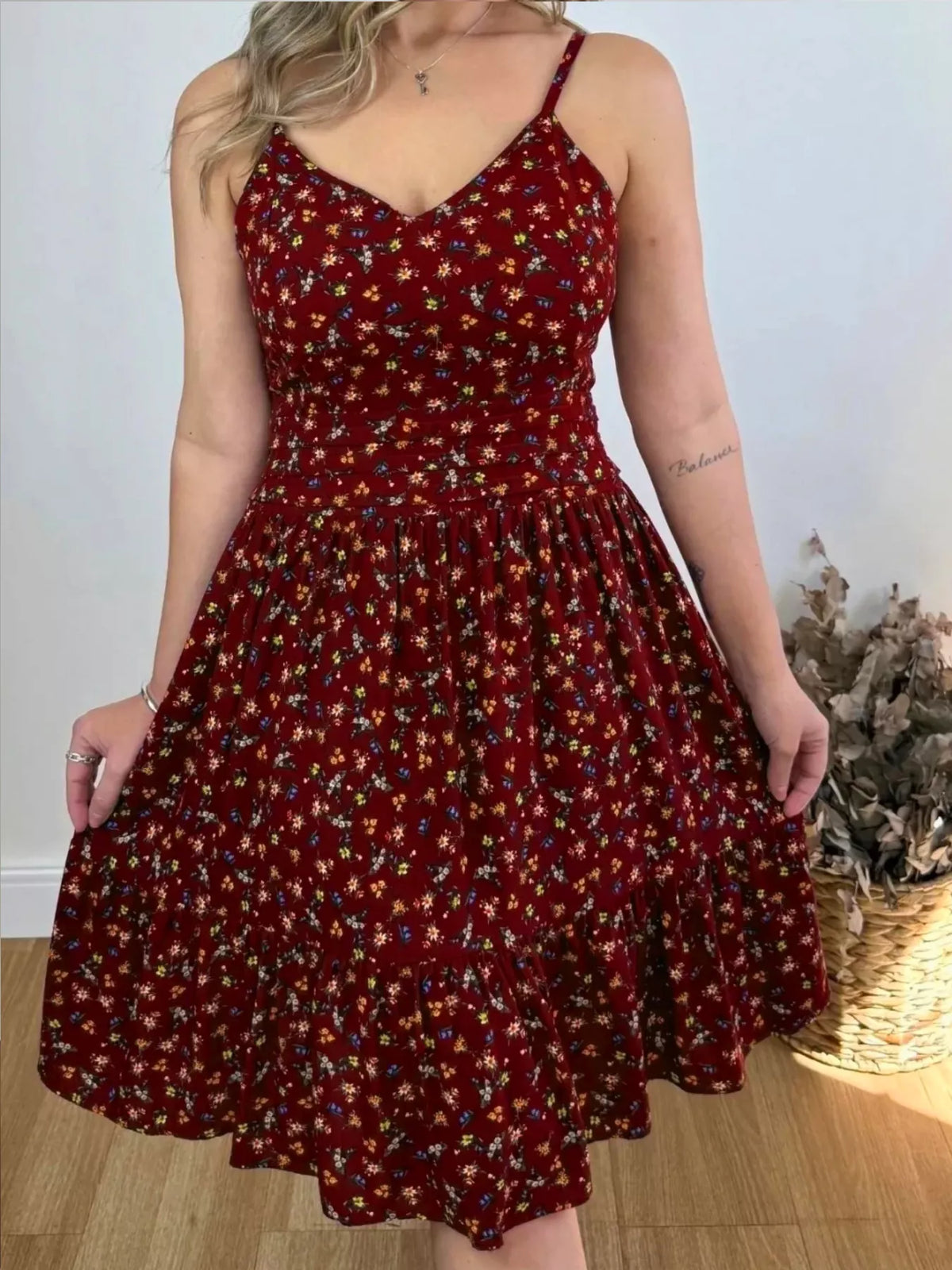Floral print spaghetti strap midi dress with ruffle hem by Plush Fashion Hub, featuring a flowy, feminine design.