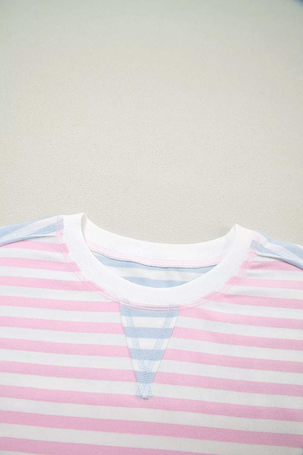 Casual oversized striped Dolman sleeve patchwork T-shirt by Plush Fashion Hub, featuring relaxed fit and colorful patch details.