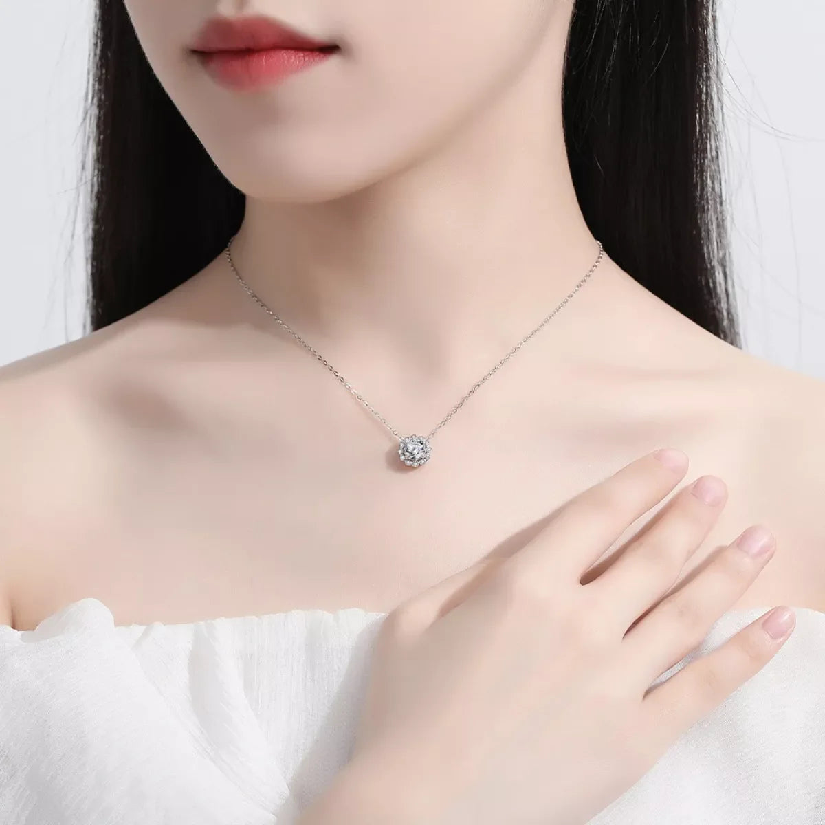 Sterling silver flower necklace with a 1 carat moissanite gemstone, elegant jewelry piece from Plush Fashion Hub.