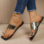 Women's stylish vegan leather toe ring flat sandals with summer comfort and trendy design, perfect for casual warm-weather wear.