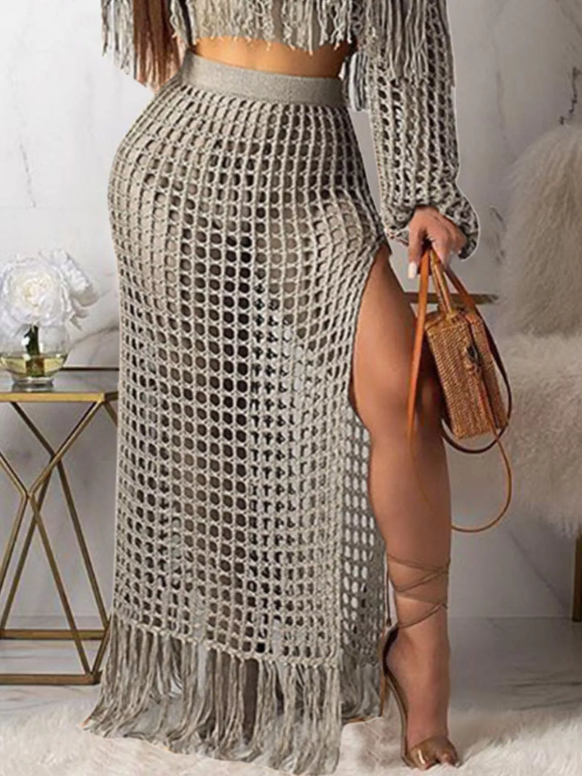 Plus size crochet off-shoulder fringe top and skirt set from Plush Fashion Hub, featuring a stylish matching set with boho details.