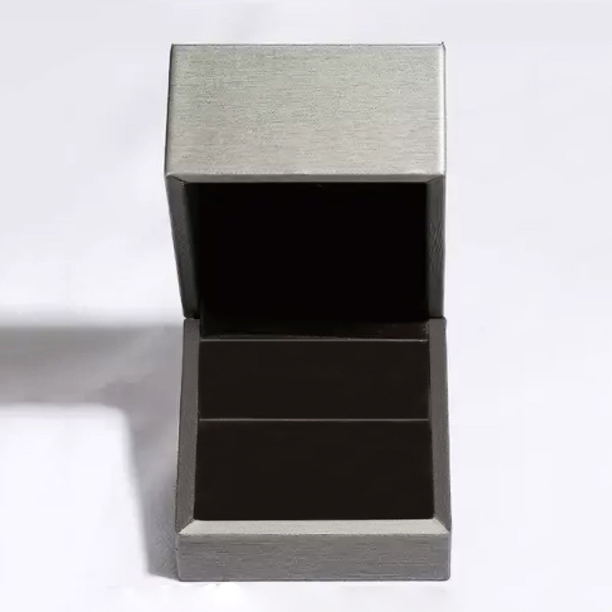 Sterling silver ring with double layered design, featuring polished bands and intricate detailing, from Plush Fashion Hub.