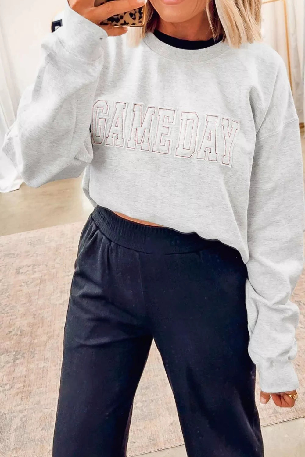 Women's long sleeve sweatshirt with embroidered letter design, round neck, in soft fabric, from Trendsi.