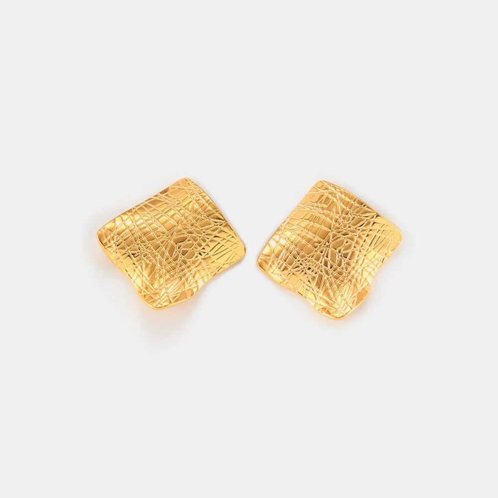 Textured titanium steel stud earrings featuring a sleek, modern design, perfect for fashion and everyday wear.