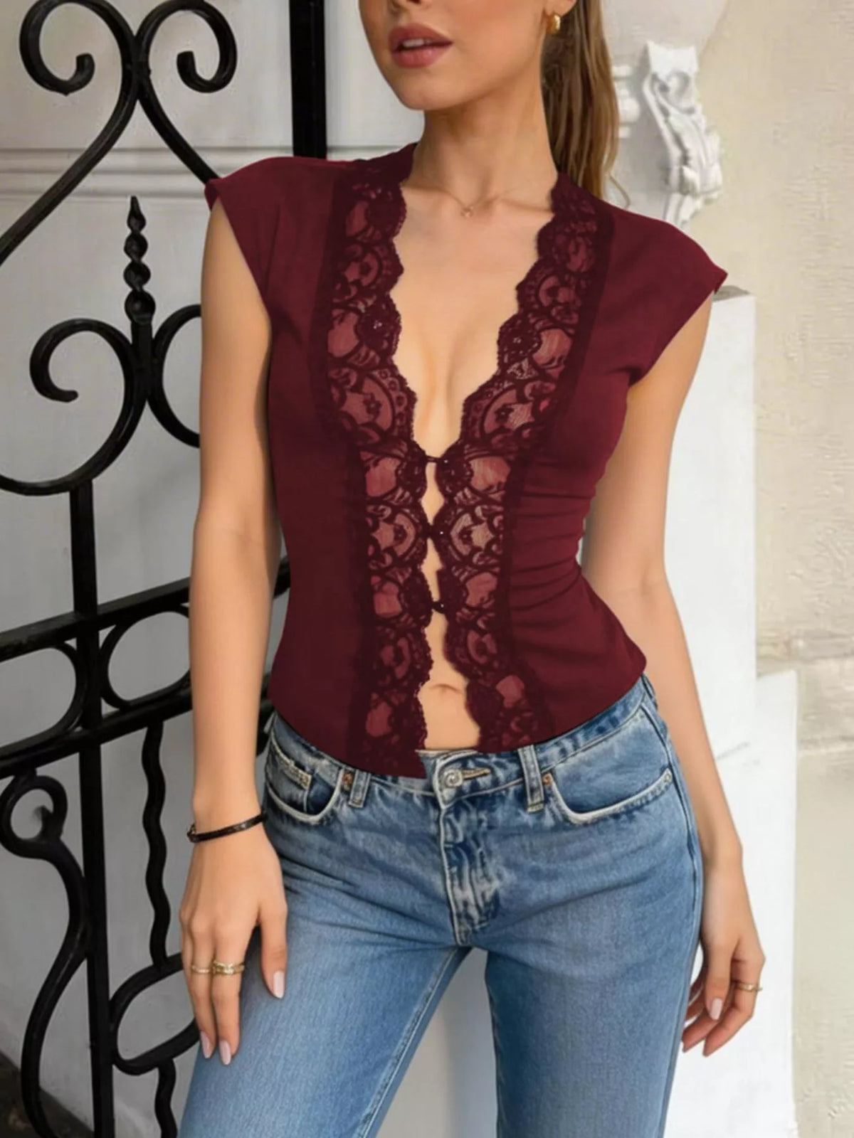 Lace trim button front vest by Plush Fashion Hub featuring a sleeveless design and delicate lace detailing on the front.