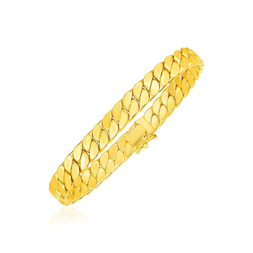 14k yellow gold men's 8-inch curb chain bracelet with polished links, showcasing a luxurious jewelry accessory.