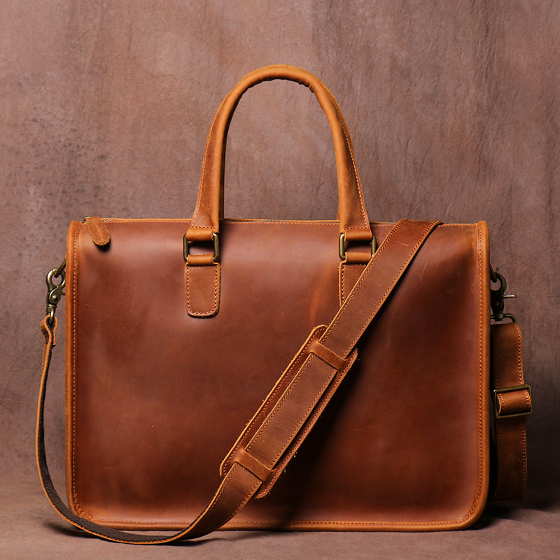 Men's Pi-Mart Crazy Horse leather briefcase with a sturdy handle, designed for laptops and professional use.