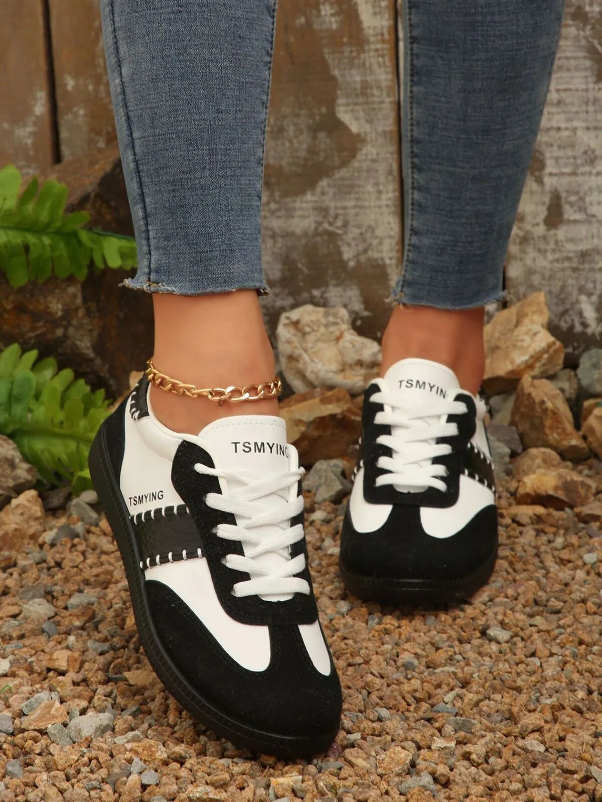 Contrast lace-up sneakers from Trendsi featuring stylish design and comfortable footwear for casual wear.
