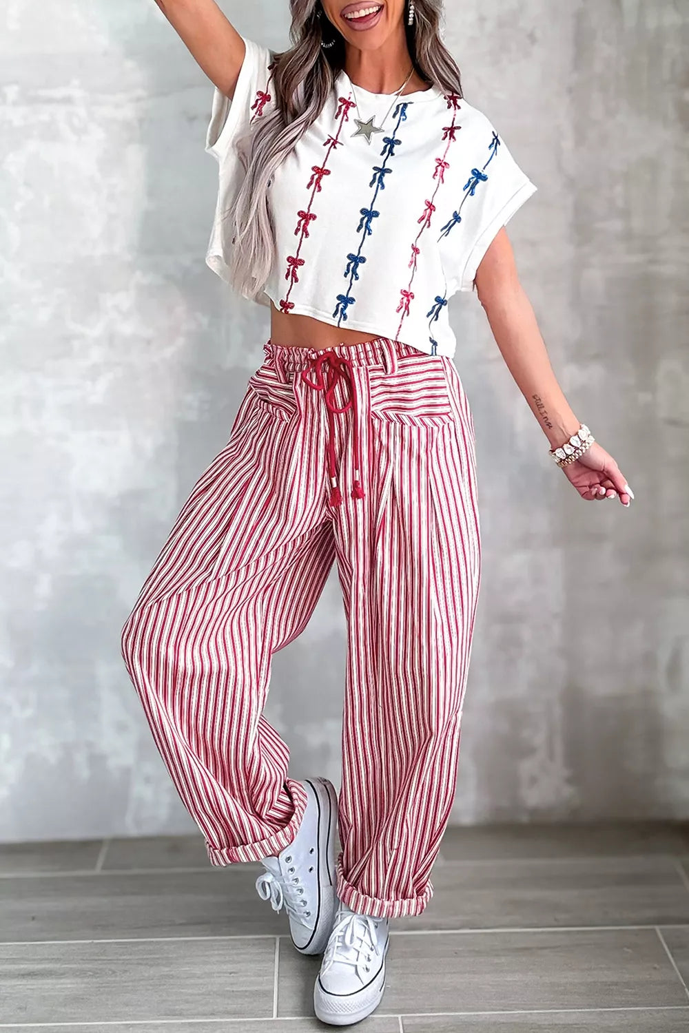 Light beige stripe drawstring casual loose pants from Trendsi with relaxed fit and comfortable waistband, ideal for everyday wear.