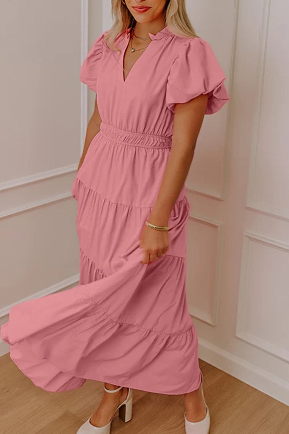 Women's floral ruffled tiered puff sleeve maxi dress by Trendsi, featuring elegant long design with ruffle details and tiered layers.