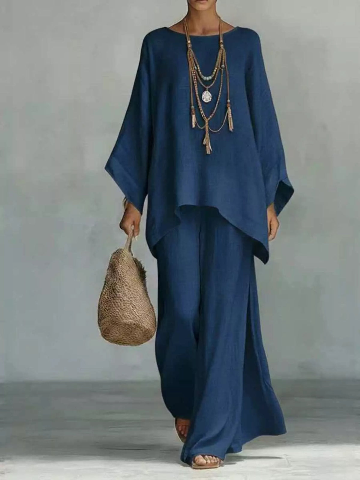 Plus size round neck top and wide-leg pant set by Plush Fashion Hub, casual comfortable matching clothing for women.