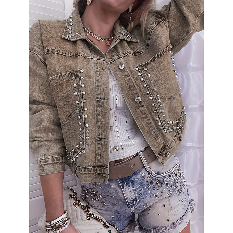 Women's studded denim jacket by Plush Fashion Hub featuring classic blue denim with silver stud embellishments.