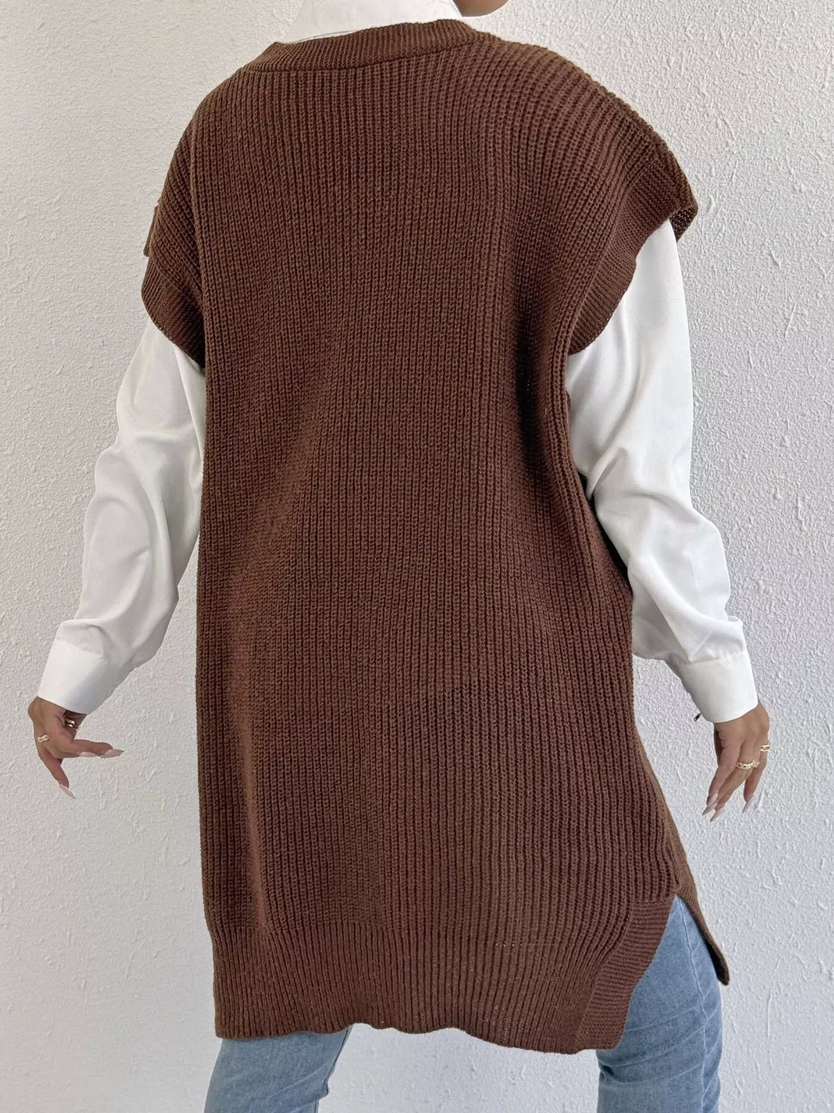 Embroidery bow V-neck sweater vest by Trendsi featuring intricate embroidery, soft knit fabric, and a stylish V-neck design.