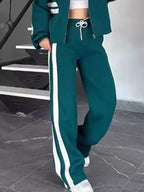 Plus size contrast stripe zip-up activewear jacket and pants set by Plush Fashion Hub, full size, stylish and comfortable.