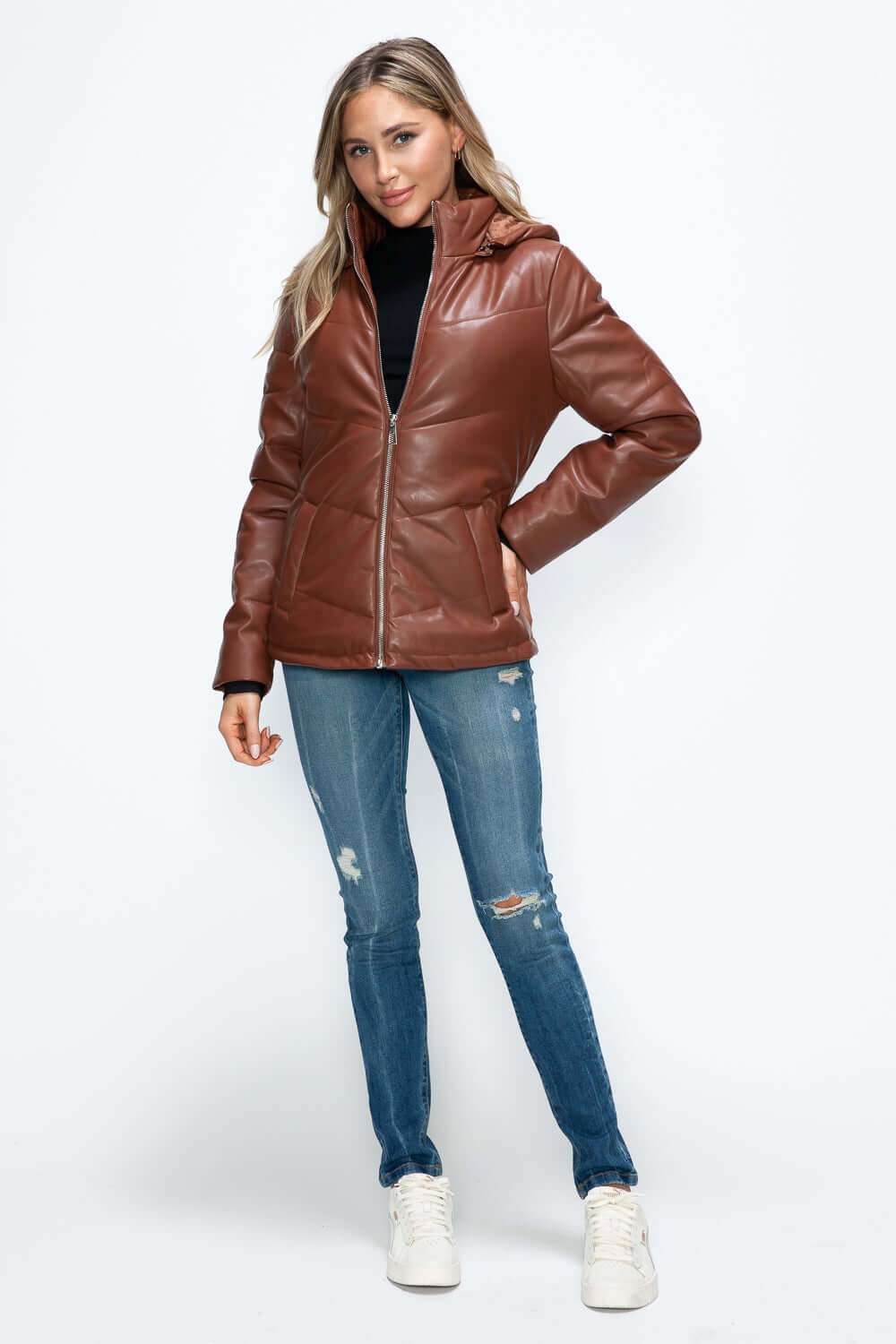 Pocketed zip up puffer jacket with removable hood, 100% pleather, cozy and stylish.