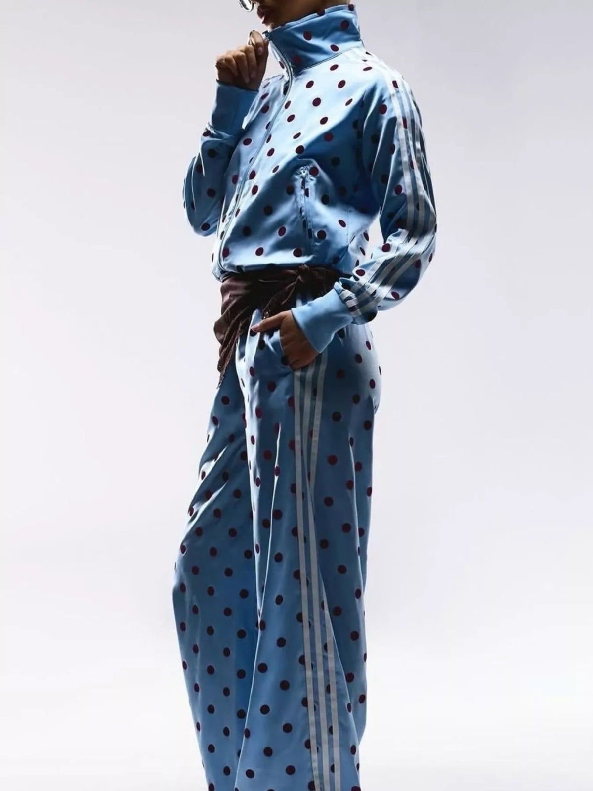 Polka dot zip-up outerwear and pants set by Plush Fashion Hub, featuring a matching design with a playful polka dot pattern.